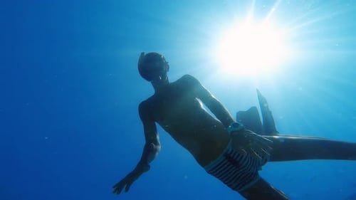 Man Underwater With Long Fins