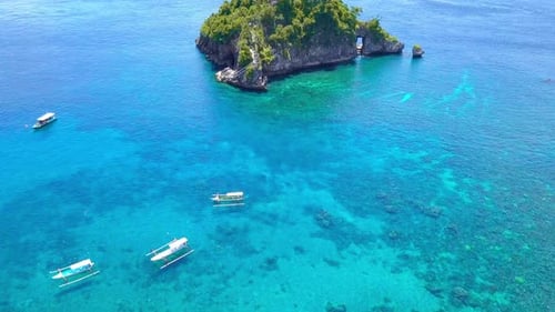 Indonesian Boats and Small Tropical Island