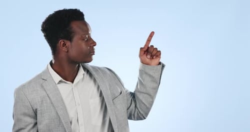 Black man, pointing and list on mockup for advertising or marketing against a blue studio