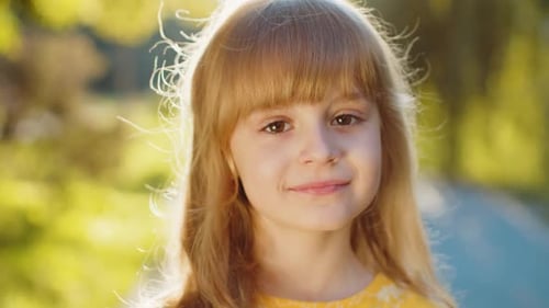 Portrait of Happy Preteen Child Girl Face Smiling Looking at Camera Good Mood Satisfied on Park