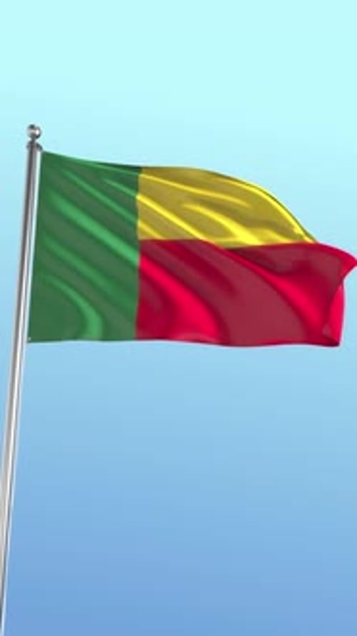 Realistic Waving Flag of Benin Against Clear Blue Sky