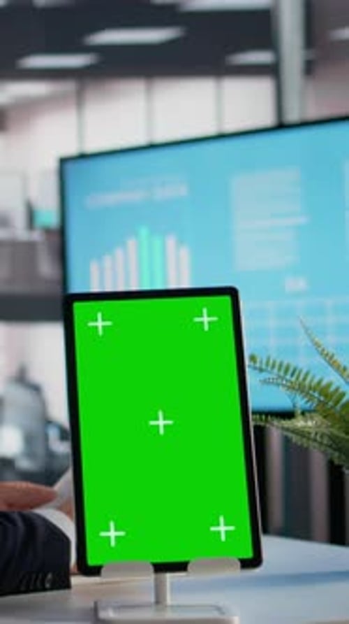 Vertical Video Vertical Chroma Key on Tablet with Businessman Analyzing Company KPIs