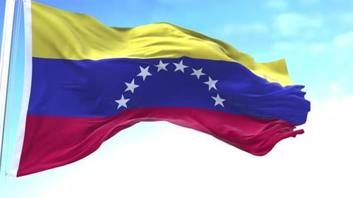 Realistic Venezuela Flag Waving Against Blue Sky