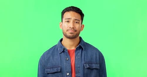 Man, portrait and green screen or unhappy and shaking head for bad rating, review or feedback