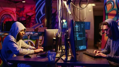 Team of Hackers Developing Spyware