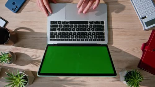 Remote Worker Browsing Mockup Laptop at Modern Office Desk Closeup Top View