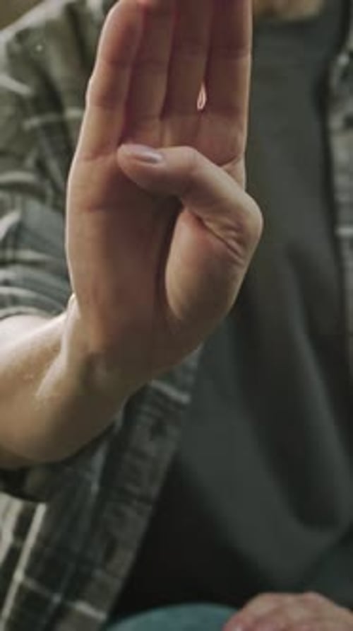 Hand Closes and Opens Making a Fist