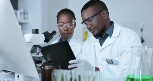 Scientists Working Together in a Modern Lab