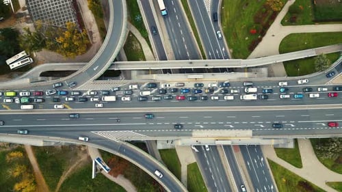 Aerial shot of elevated road junction. Drone footage of top view of Highway road junctions. The Inte