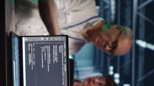 Vertical IT Team Running Code in Data Center