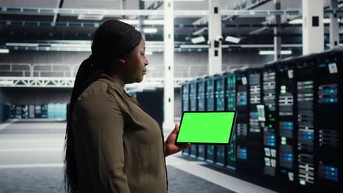Data Center Green Screen Laptop and Tablet Prepared for Infrastructure Maintenance