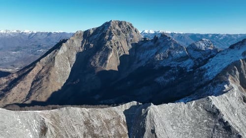 Aerial view of mountain peaks and ridges, Italy.