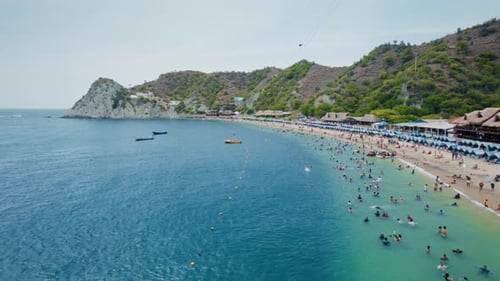 Aerial view of Active Beach, Speedboats, and Touristic Towers – Playa Blanca, Santa Marta