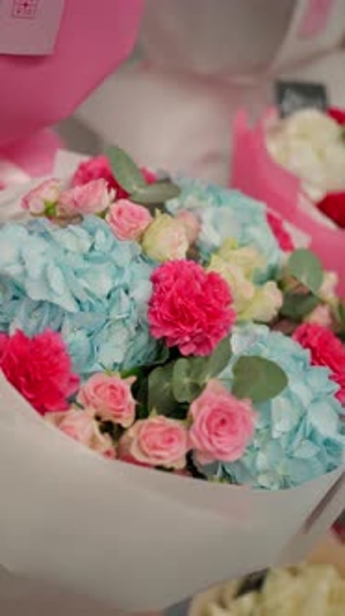 Beautiful bouquet with roses and hydrangeas in paper