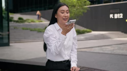 Happy Asian Korean Japanese Chinese Woman Record Sending Voice Message Smiling City Online