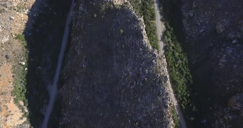 Mountain, range or road drone on highway for environmental landscape, green trees