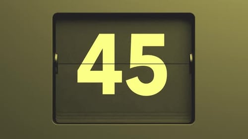 Vintage flip clock display showing number forty five yellow digits dark background mechanical timer
