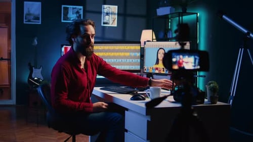 Man Creates Content In Dimly Lit Room