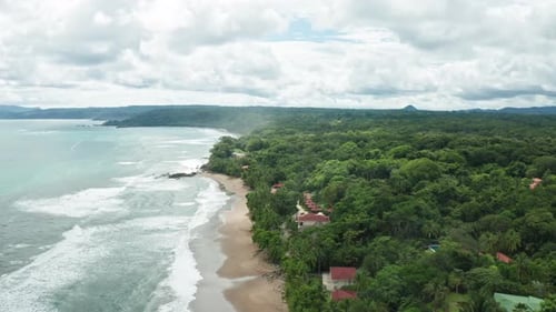4K Aerial Drone shot of Tambor Empty Beach in Costa Rica.
Dramatic Weather with Waves Smashing again