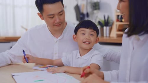 Family Drawing Together at Home