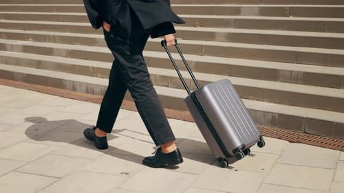 Tourist Man with Suitcase Baggage in Spain A Traveler with Luggage Suit Jacket on Business Street Go