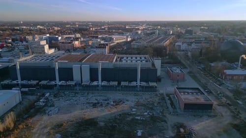 Massive Urban Industrial Complex Aerial View During a Clear Golden Sunset