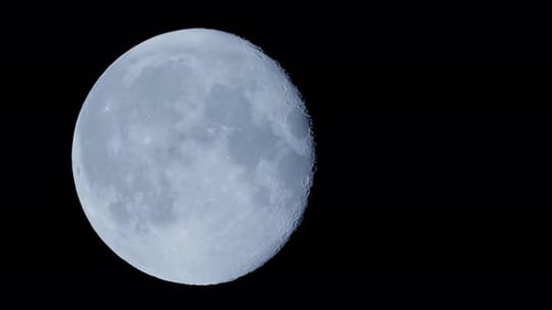 Experience a Magnificent Full Moon in the Night Sky Enjoy a Clear and Detailed Lunar View