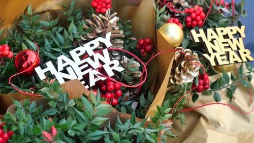 Festive New Year Decorations with Berries and Pinecones