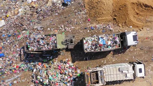 Aerial View of Waste Trucks at Landfill Site