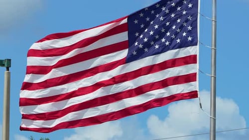 American Flag Waving Proudly on a Windy Day