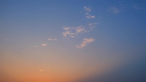 A timelapse captures the sunrise sky, Time-lapse footage.