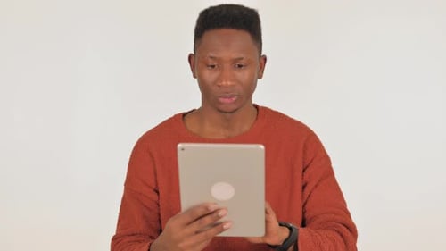 Man Reacts Negatively to Content on Tablet