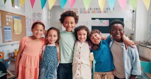 Happy Children Smiling Together in a Classroom