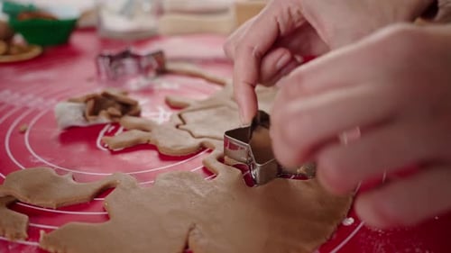 Cutting Out Christmas Gingerbread Cookies With Metal Cutters