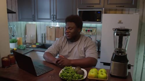 Overweight Blogger Telling Healthy Meal Recipe during Live Stream