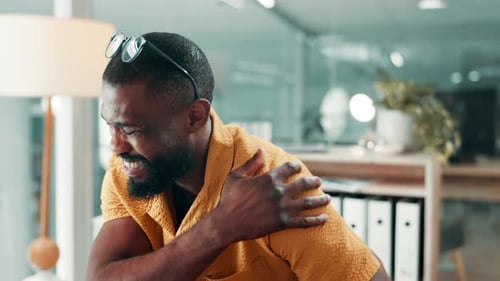 Black man, shoulder pain and stress with computer at office with fatigue