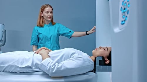 Woman Undergoes Medical Scanning Procedure with Doctor Present