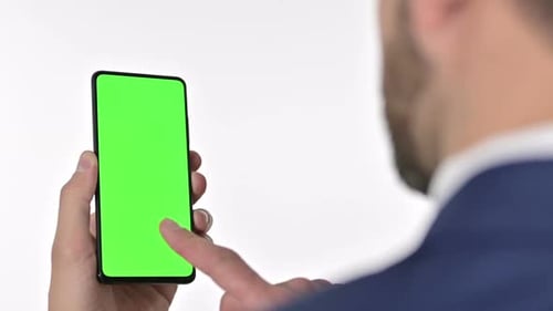 Man Using Green Screen Phone in Studio