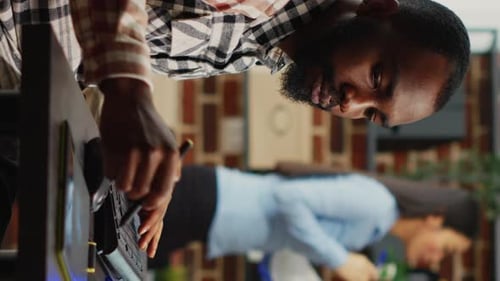 Man Using Graphic Tablet in Office Workplace