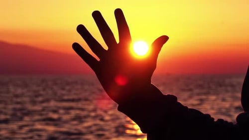 My Hand At The Red Ocean Sunset