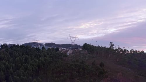 Transmission Tower In The Mountains At Sunrise Near Porto, Portugal. - aerial