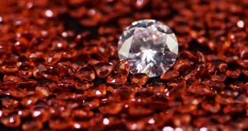 Sparkling Diamond Among Red Gems Panning Shot