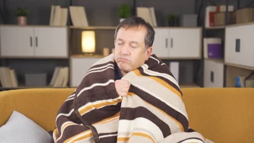 The old man is cold.
