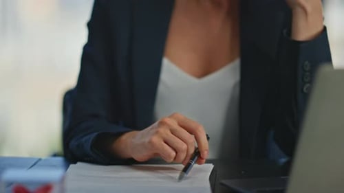 Office Hand Holding Pen Closeup Thoughtful Businesswoman Analysing Documents