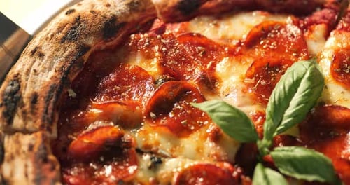 Close Up of Pepperoni Pizza Slice Being Taken