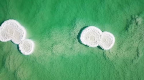 Aerial footage of Round shaped Salt deposits in the heart of the Dead Sea.