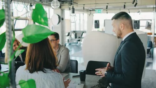 A Professional Business Team in a Contemporary Office Collaborates on Projects Strategies Teamwork