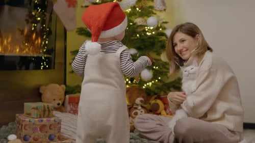 Woman and Child with Cat at Christmas