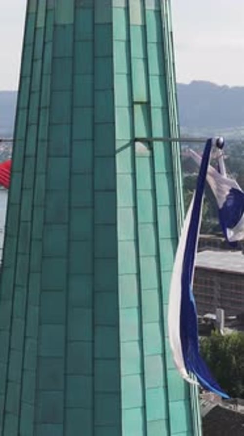 Aerial video of the Swiss flag in the Grossmunster church
