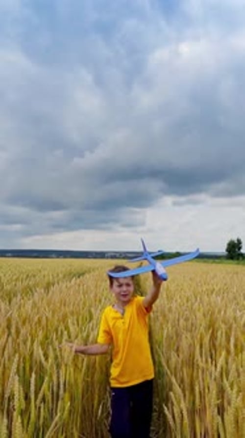 Child plays outdoors.